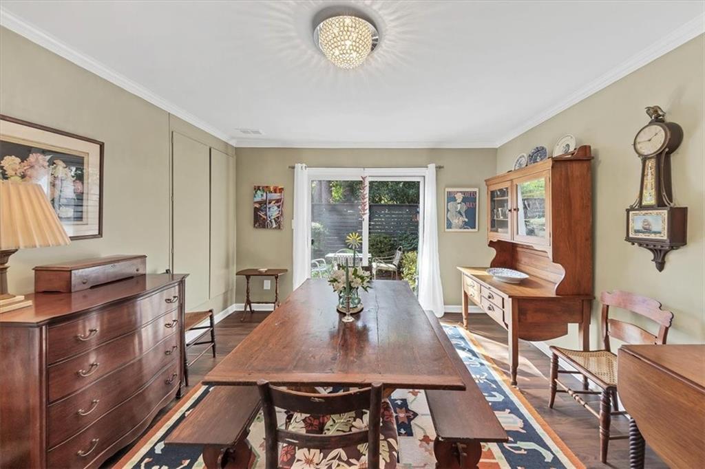 45 Forrest Place Northeast Atlanta, GA 30328 - Photo 15 of 51 a view of a dining room with furniture window and outside view