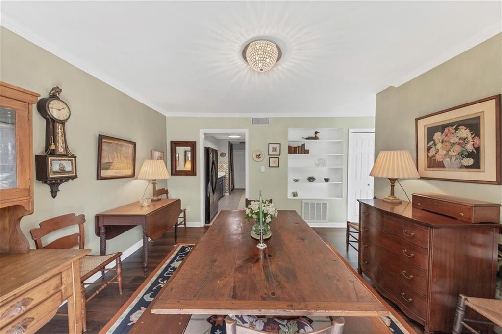 45 Forrest Place Northeast Atlanta, GA 30328 - Photo 17 of 51 a living room with furniture and a flat screen tv