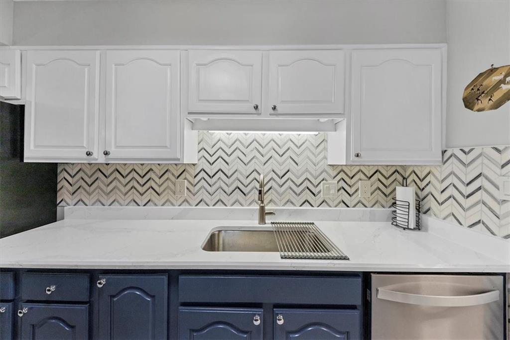 45 Forrest Place Northeast Atlanta, GA 30328 - Photo 20 of 51 a kitchen with a sink and cabinets