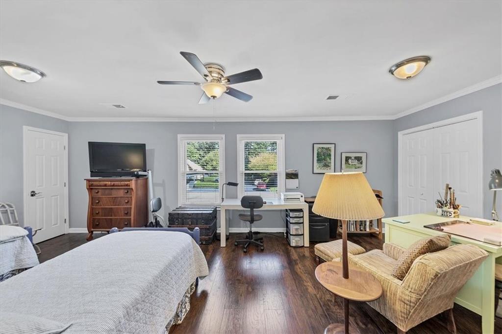 45 Forrest Place Northeast Atlanta, GA 30328 - Photo 25 of 51 a living room with furniture and a flat screen tv