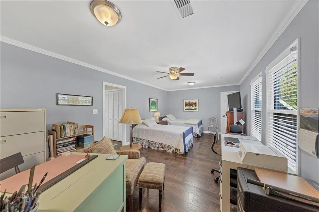 45 Forrest Place Northeast Atlanta, GA 30328 - Photo 28 of 51 a living room with furniture and a chandelier