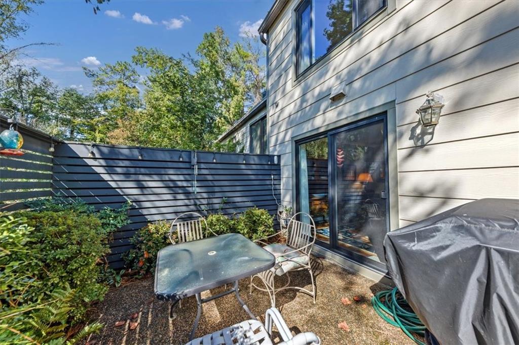 45 Forrest Place Northeast Atlanta, GA 30328 - Photo 38 of 51 a view of an outdoor sitting area