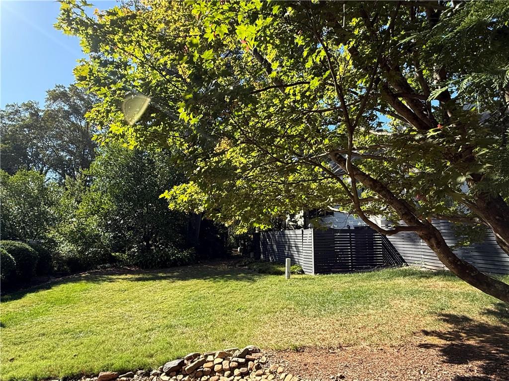 45 Forrest Place Northeast Atlanta, GA 30328 - Photo 44 of 51 a view of a backyard