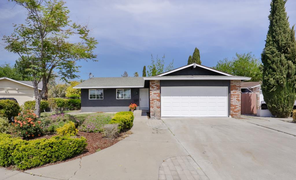1624 Farringdon Court San Jose, CA 95127 - Photo 1 of 62 a front view of a house with a garden