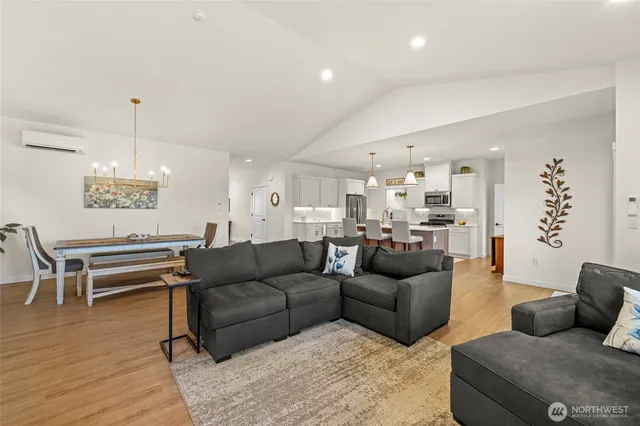 a living room with furniture and a table