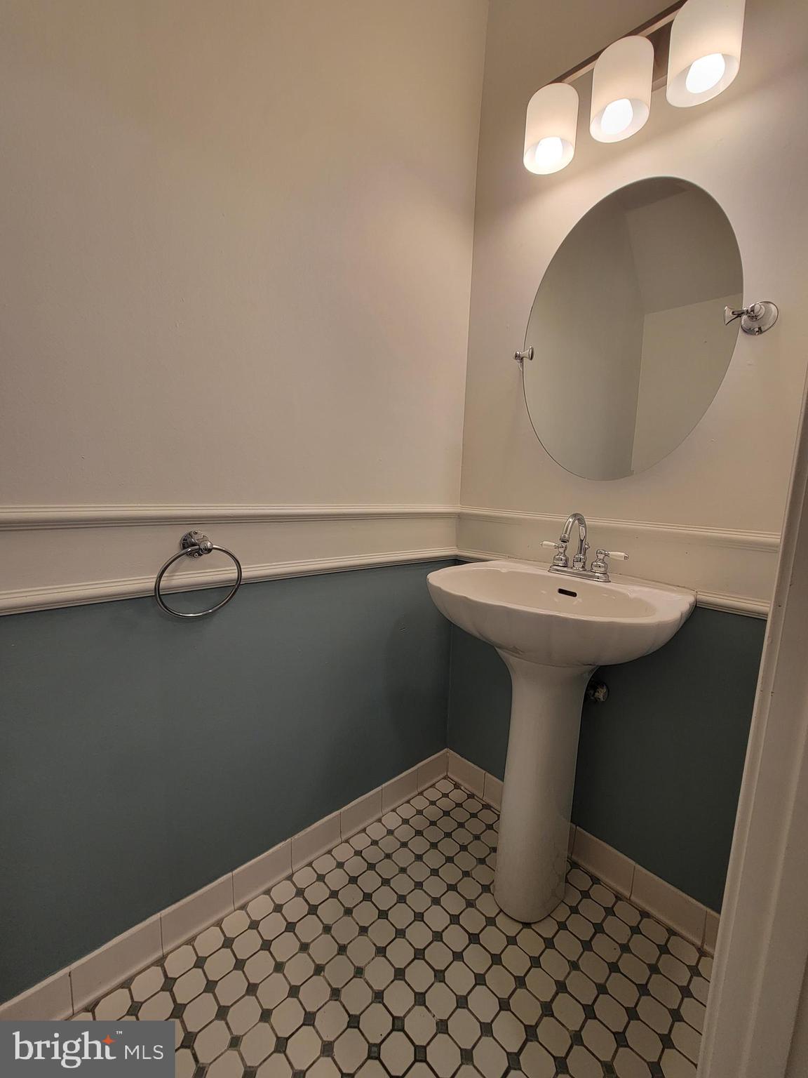 1727 Fitzwater Street, Unit B Philadelphia, PA 19146 - Photo 18 of 31 a bathroom with a sink toilet and vanity