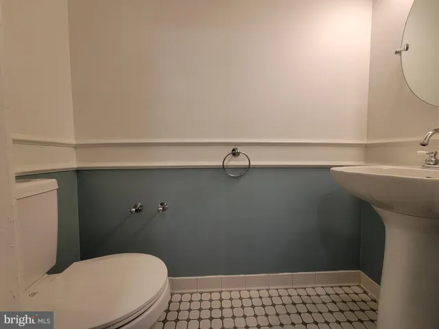 a bathroom with a sink and a toilet