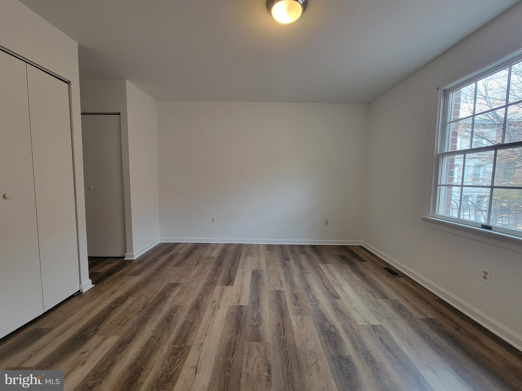 1727 Fitzwater Street, Unit B Philadelphia, PA 19146 - Photo 20 of 31 a view of an empty room and window