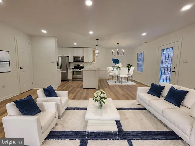 a living room with furniture or couch and a coffee table