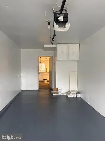 a view of room with gym equipment