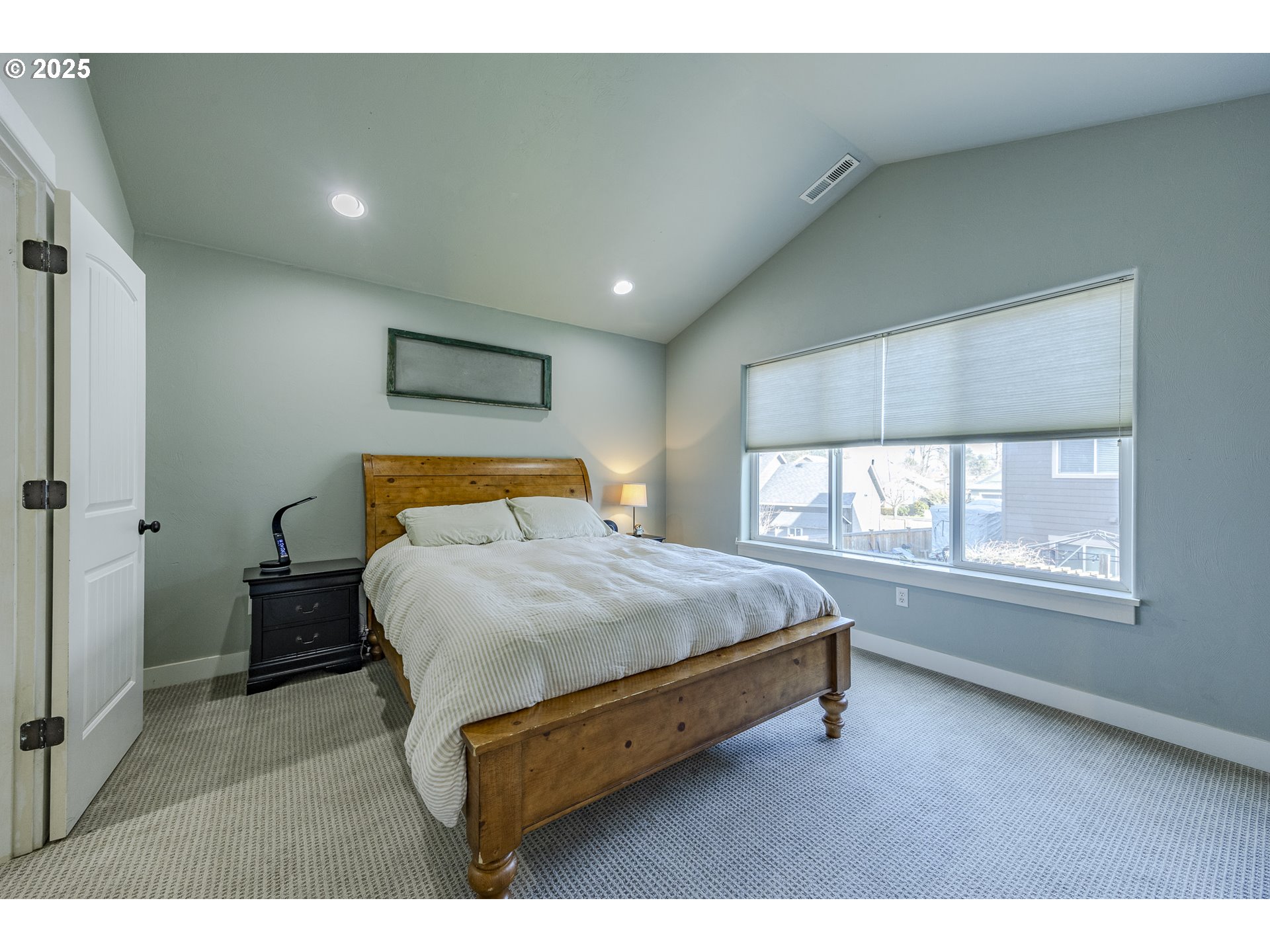 2409 Crowther Drive Eugene, OR 97404 - Photo 26 of 48 a bed room with a bed and a large window