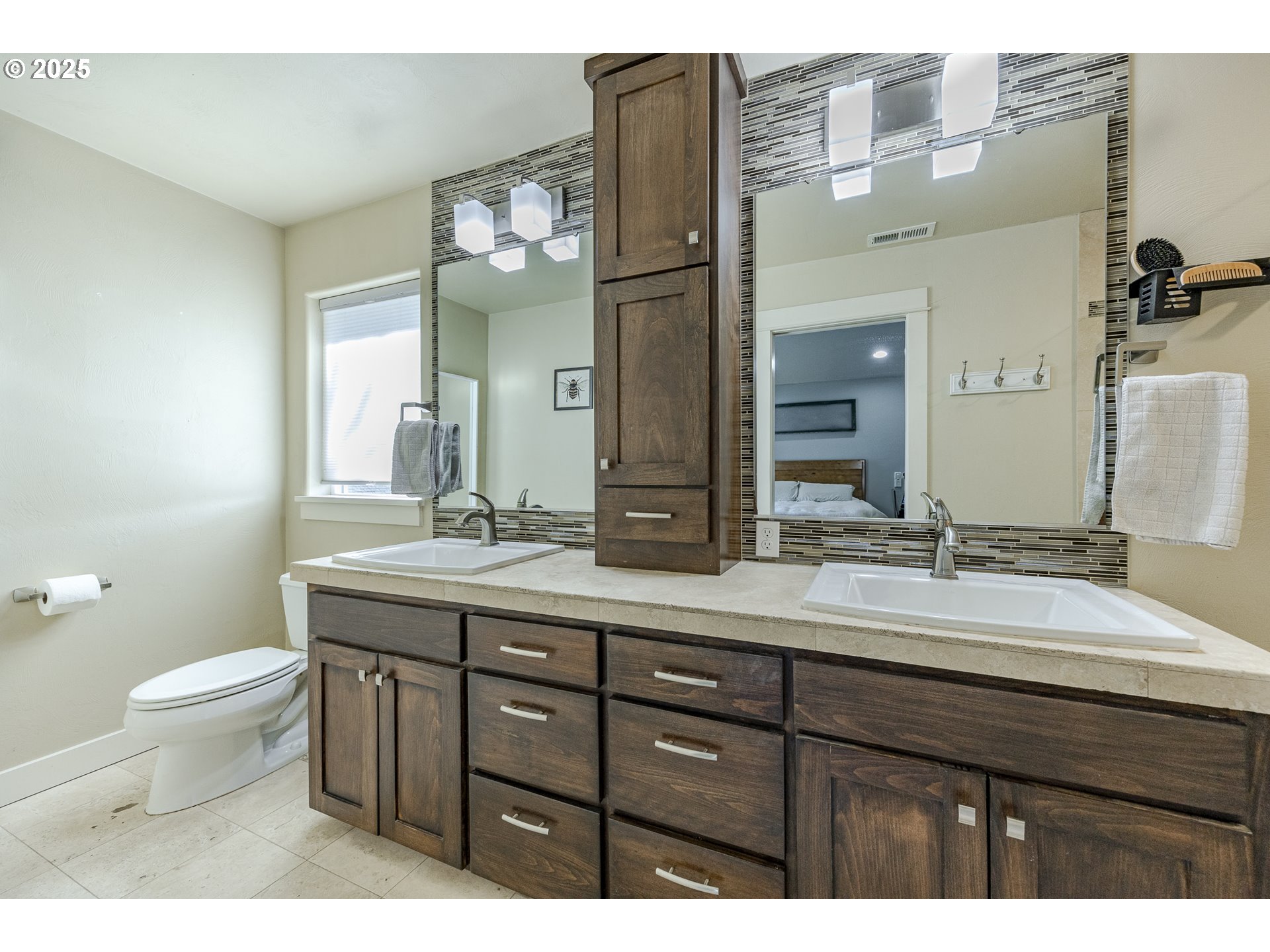 2409 Crowther Drive Eugene, OR 97404 - Photo 29 of 48 a bathroom with a granite countertop sink a toilet and a mirror