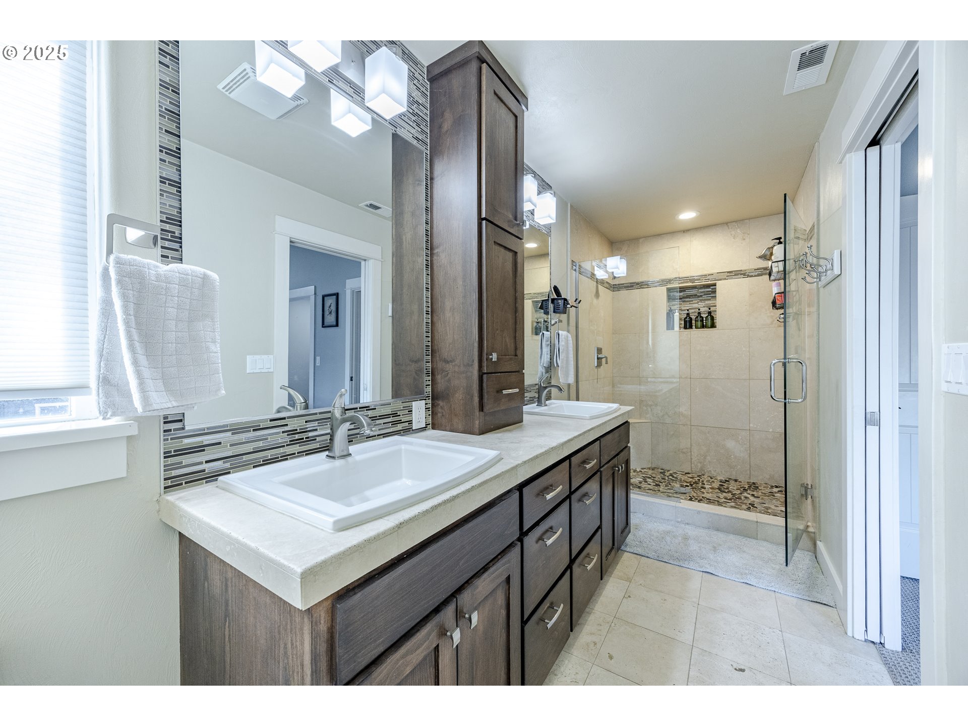 2409 Crowther Drive Eugene, OR 97404 - Photo 30 of 48 a bathroom with a sink double vanity granite and a mirror