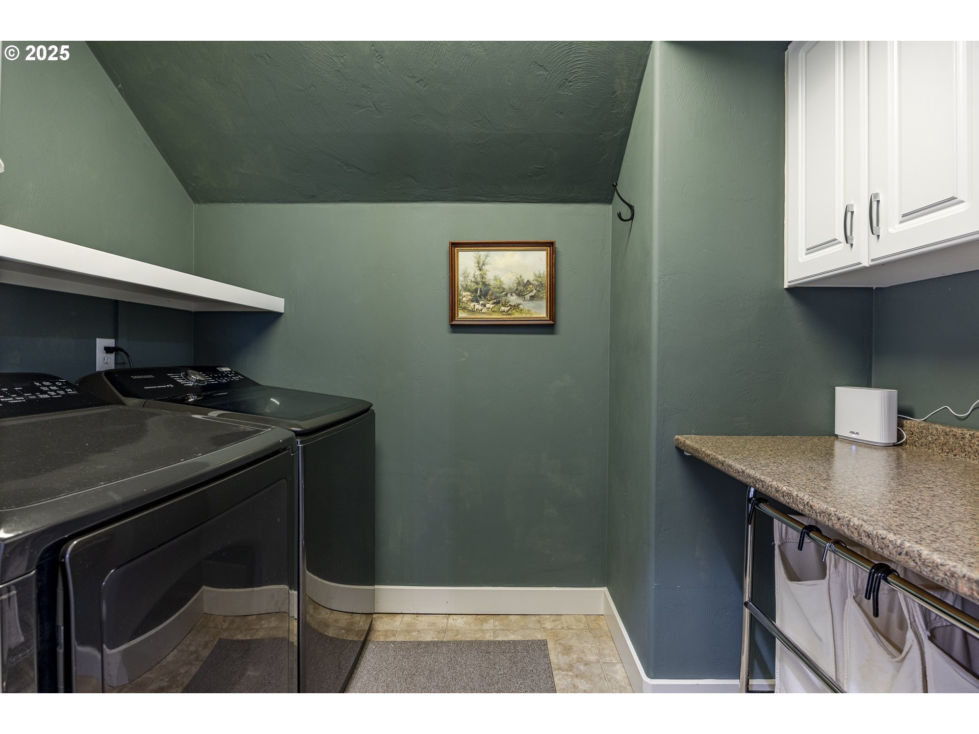 2409 Crowther Drive Eugene, OR 97404 - Photo 35 of 48 a kitchen with a sink cabinets and a wooden floor