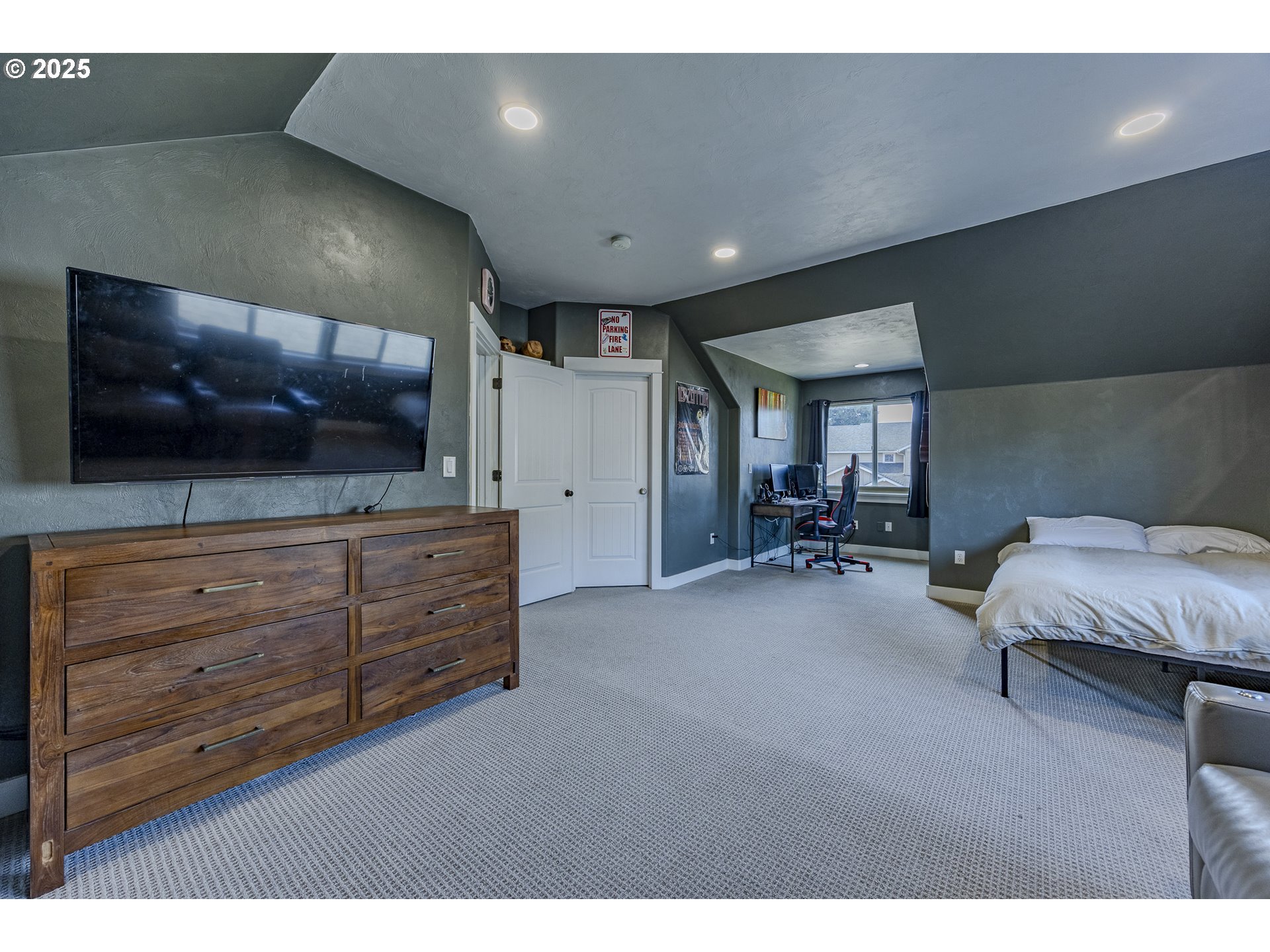 2409 Crowther Drive Eugene, OR 97404 - Photo 40 of 48 a living room with furniture and a flat screen tv