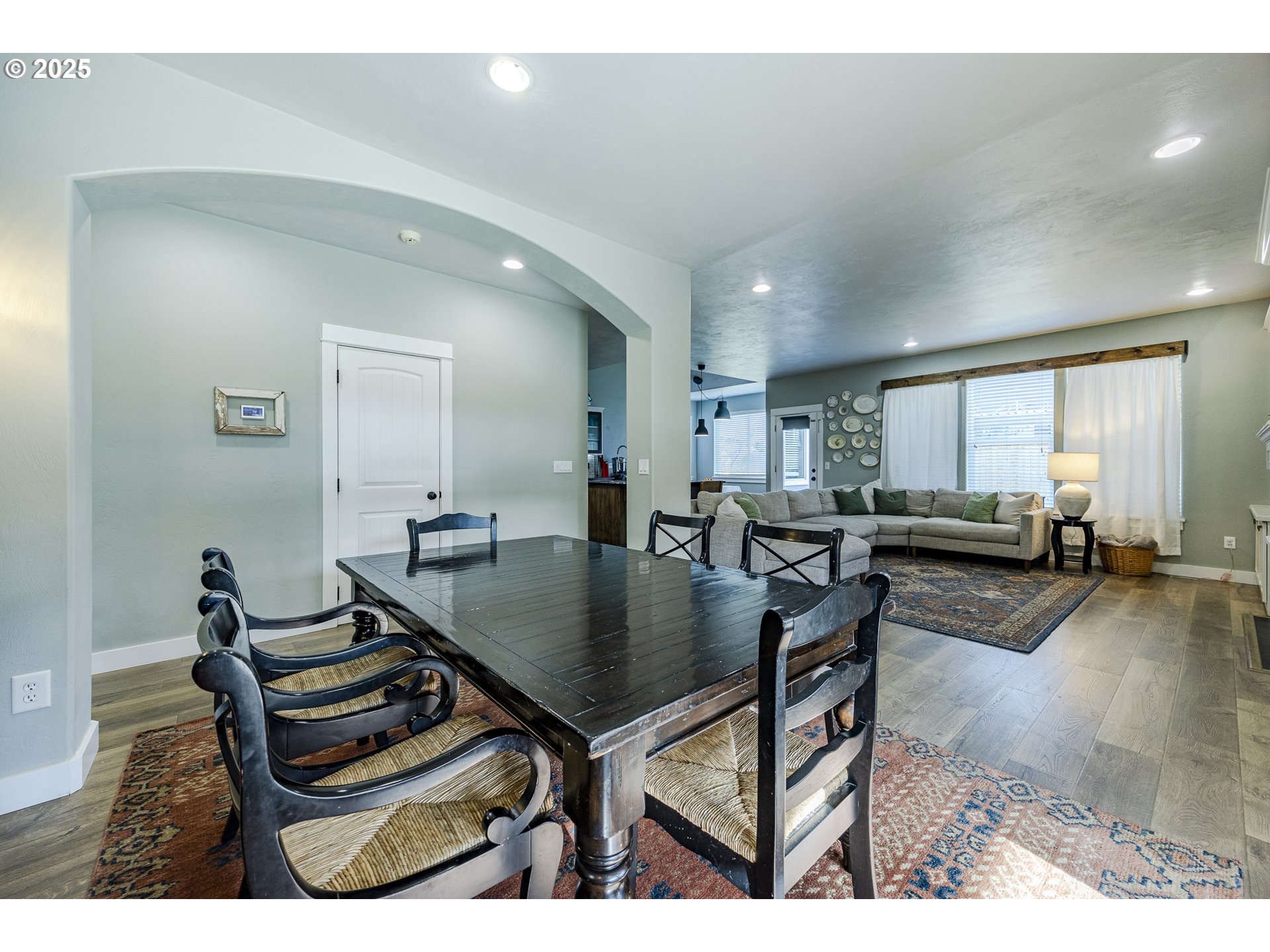 2409 Crowther Drive Eugene, OR 97404 - Photo 10 of 48 a kitchen with a table chairs and a living room
