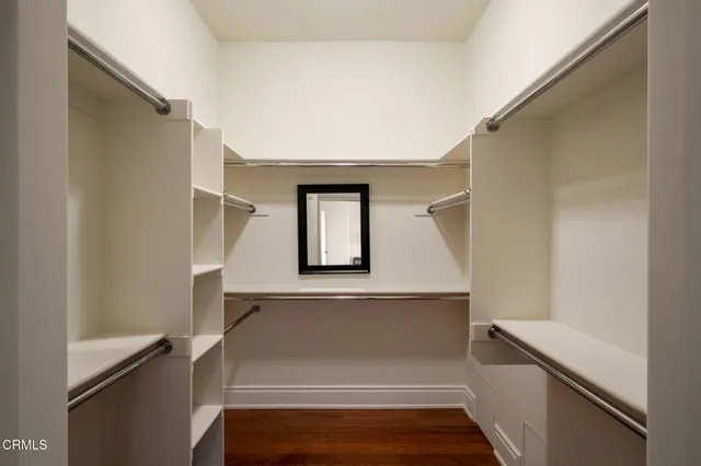 a view of walk in closet with window