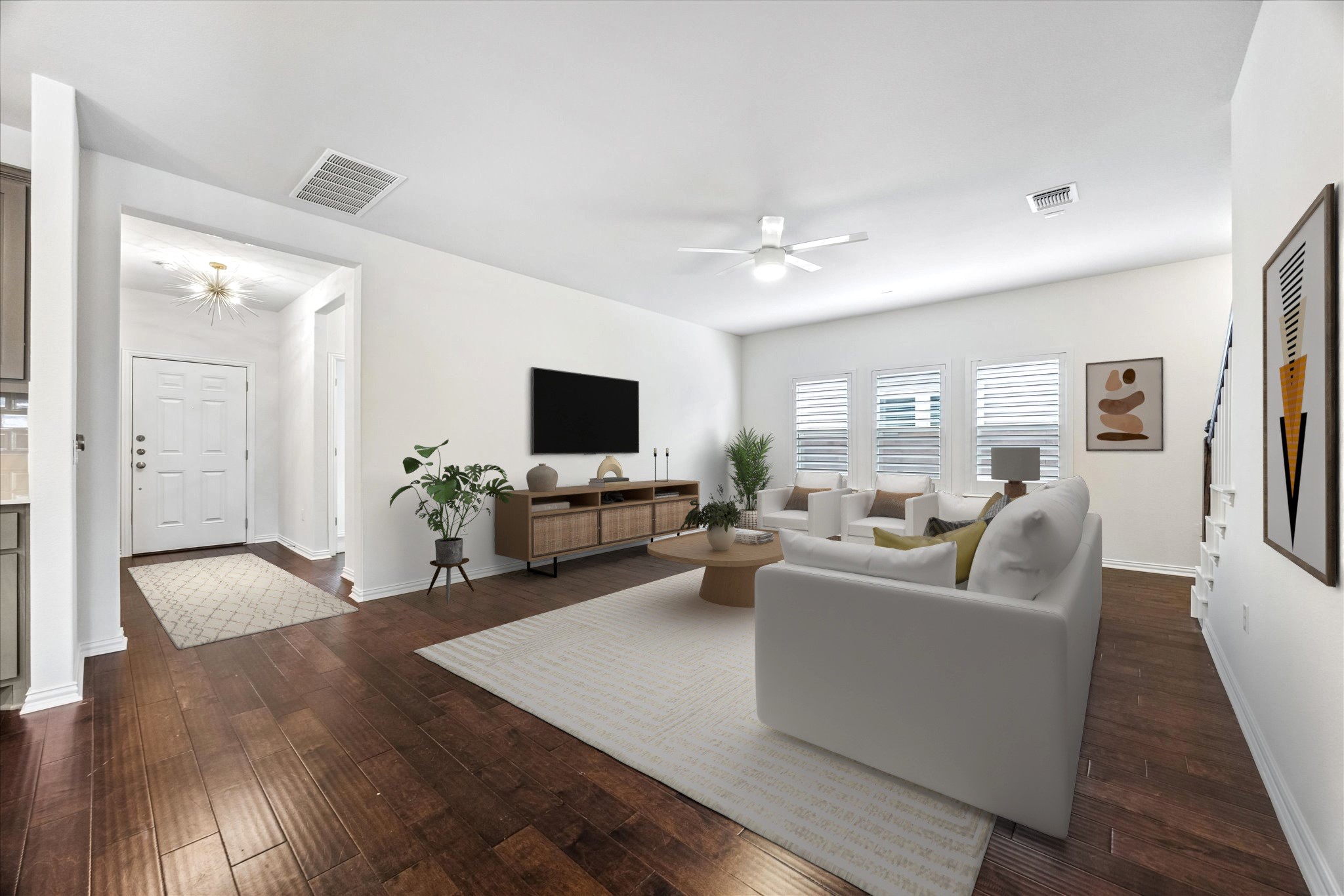 8816 Cattle Baron Path Austin, TX 78747 - Photo 4 of 32 a living room with furniture and a flat screen tv