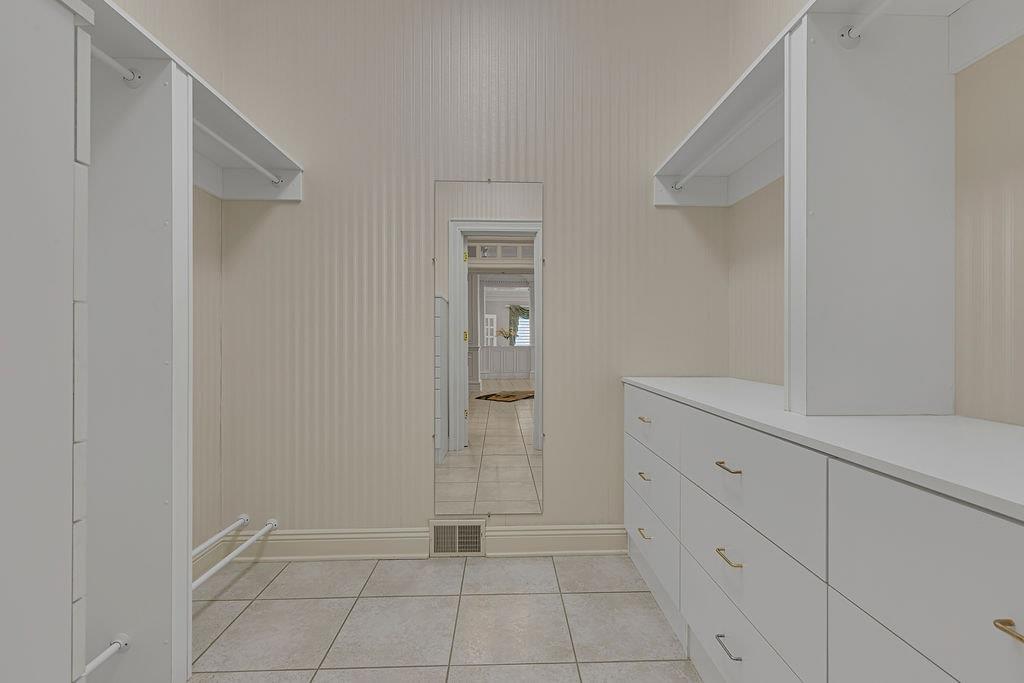 1750 River Road Beaver, PA 15009 - Photo 16 of 49 Just one of the two custom designed walk in closets in the primary suite.