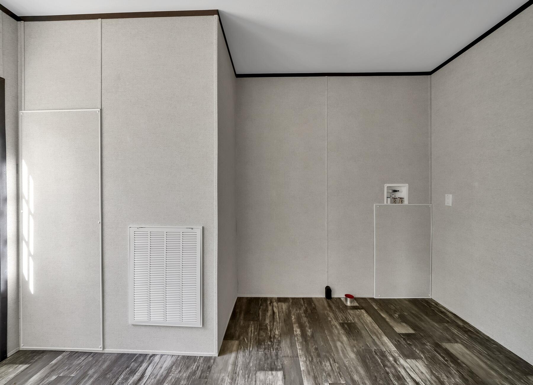 173 Gregory Dean Lane DeFuniak Springs, FL 32433 - Photo 22 of 24 a view of a closet with wooden floor