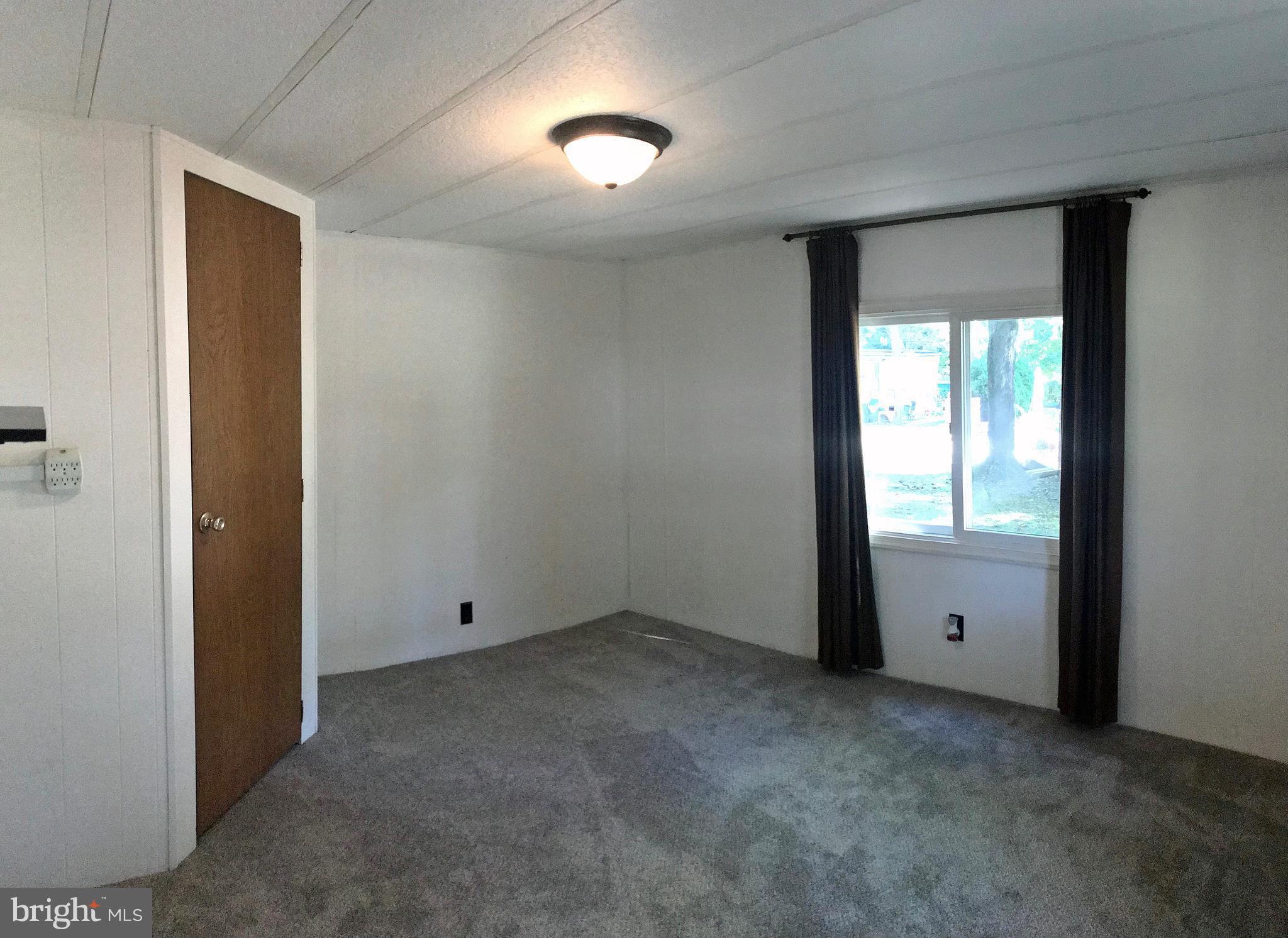 33924 Cedar Road, Unit 76 Lewes, DE 19958 - Photo 9 of 19 Master Bedroom