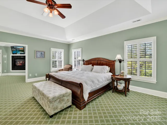 a bedroom with a bed and dresser