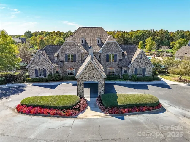 an aerial view of a house swimming pool and outdoor space