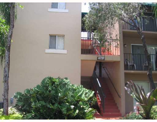 1089 Benoist Farms Road, Unit 306 Royal Palm Beach, FL 33411 - Photo 1 of 9 Curbside View