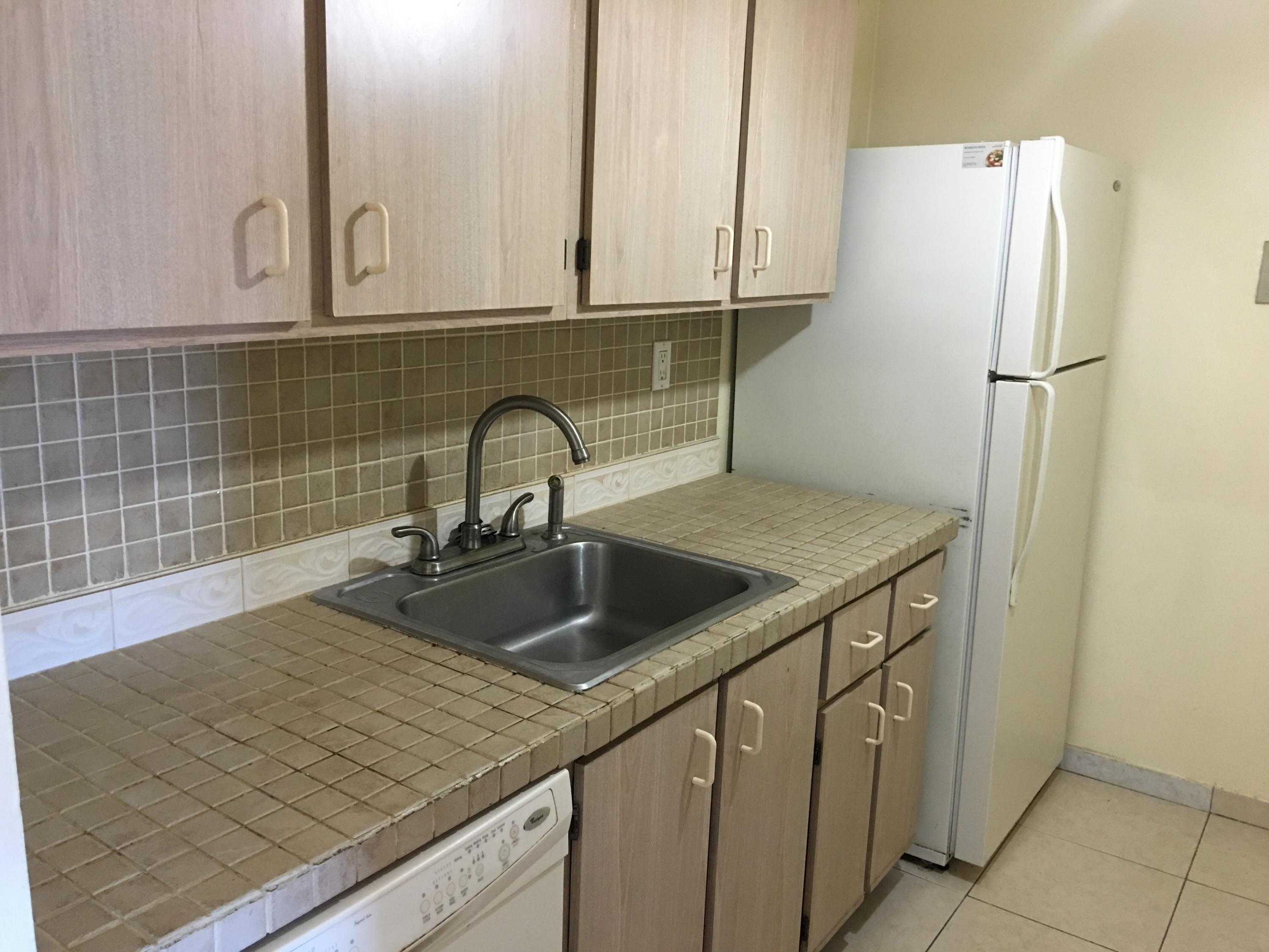1089 Benoist Farms Road, Unit 306 Royal Palm Beach, FL 33411 - Photo 2 of 9 Kitchen