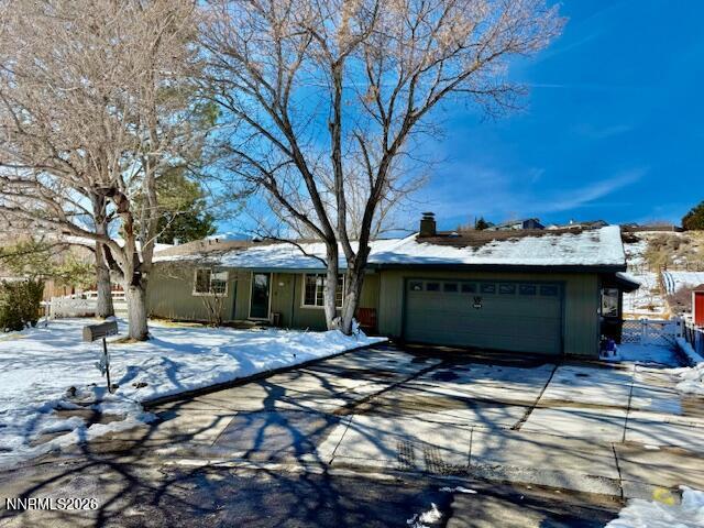 920 Ruby Court Carson City, NV 89705 - Photo 1 of 20 a view of a backyard of the house