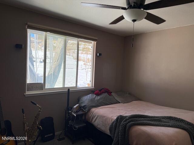 920 Ruby Court Carson City, NV 89705 - Photo 15 of 20 a bedroom with a bed and a window
