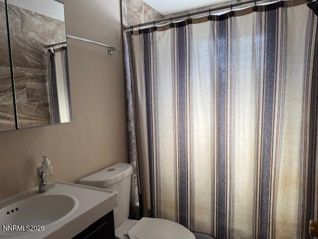 920 Ruby Court Carson City, NV 89705 - Photo 17 of 20 a bathroom with a sink and a mirror