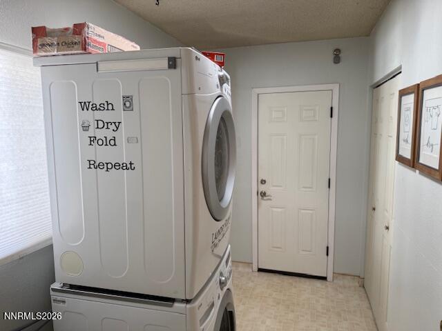 920 Ruby Court Carson City, NV 89705 - Photo 18 of 20 a view of a storage & utility room with washer and dryer