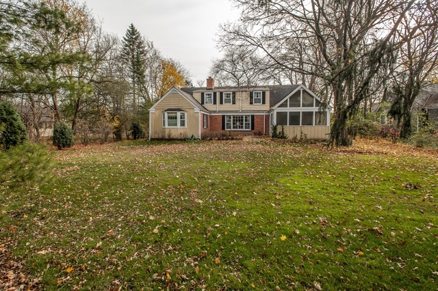 2089 Winnetka Road Northfield, IL 60093 - Photo 15 of 15 a front view of a house with a garden and trees
