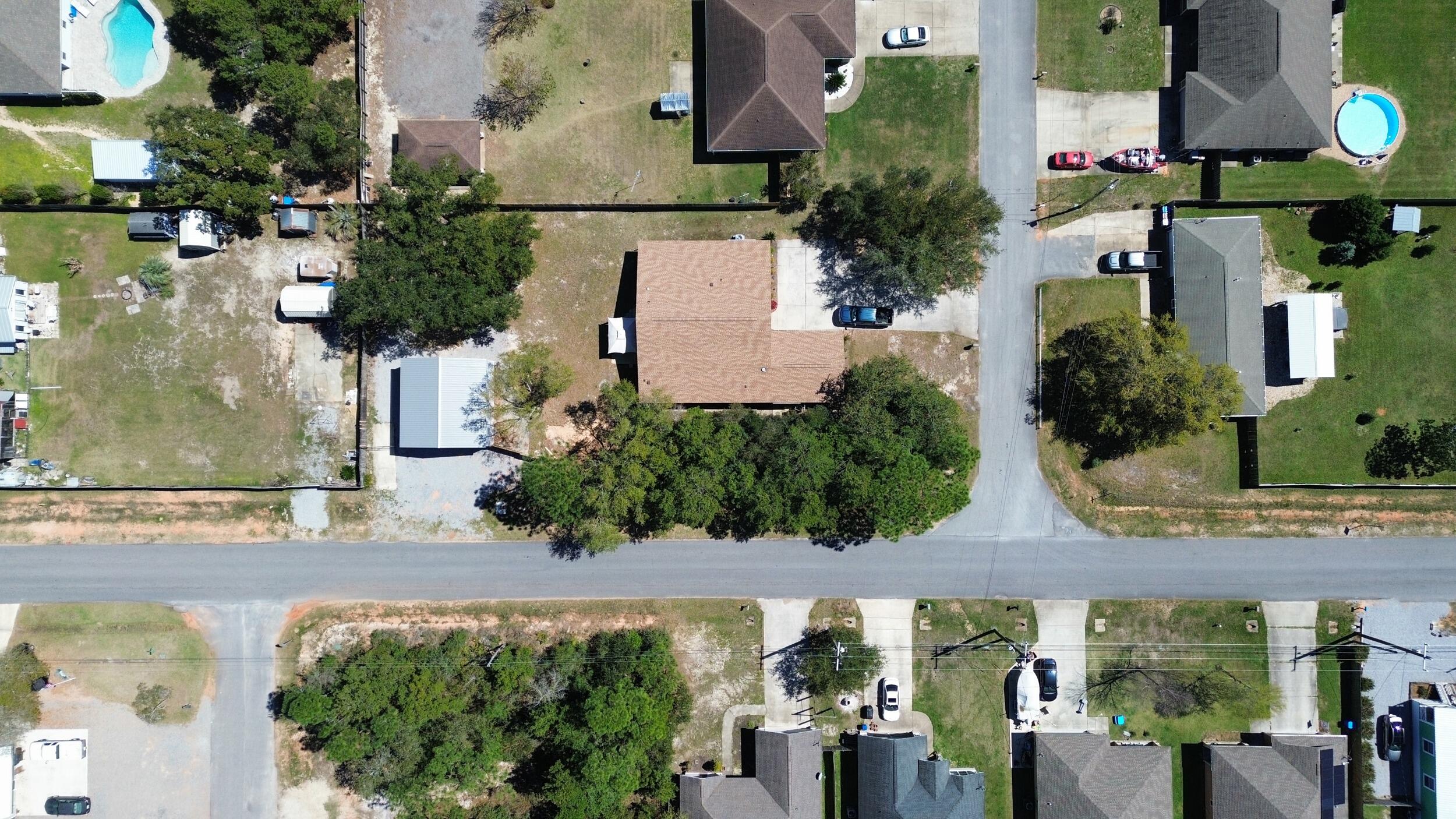 8600 Estrada Street Navarre, FL 32566 - Photo 17 of 63 an aerial view of multiple house
