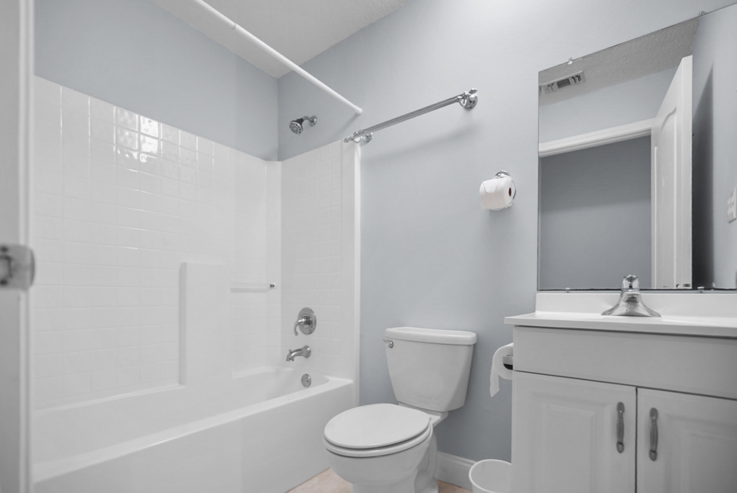 8600 Estrada Street Navarre, FL 32566 - Photo 52 of 63 a bathroom with a sink toilet and shower
