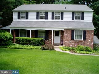 917 Penn Valley Road Media, PA 19063 - Photo 1 of 6 a view of a house with a yard and plants
