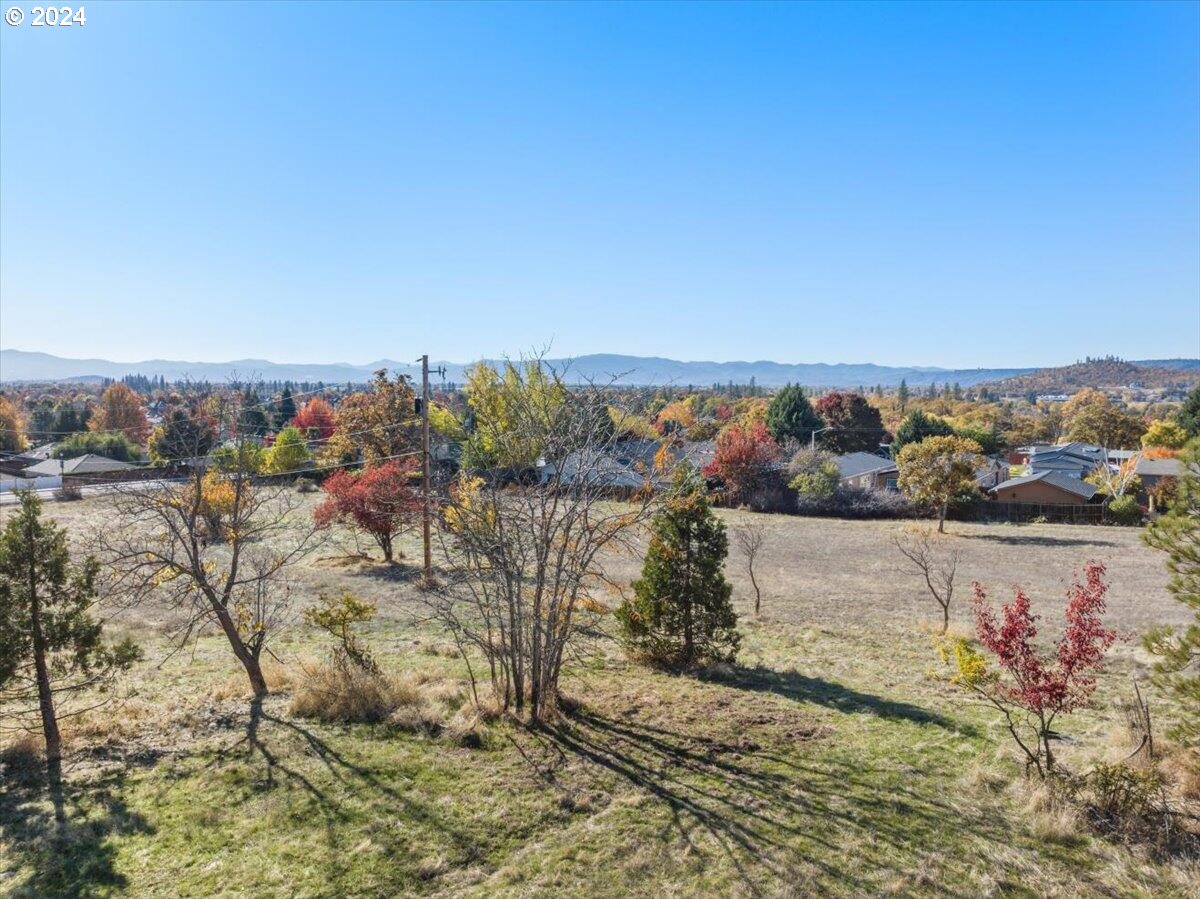653 Stevens Road Eagle Point, OR 97524 - Photo 3 of 12 a view of a lake with a city