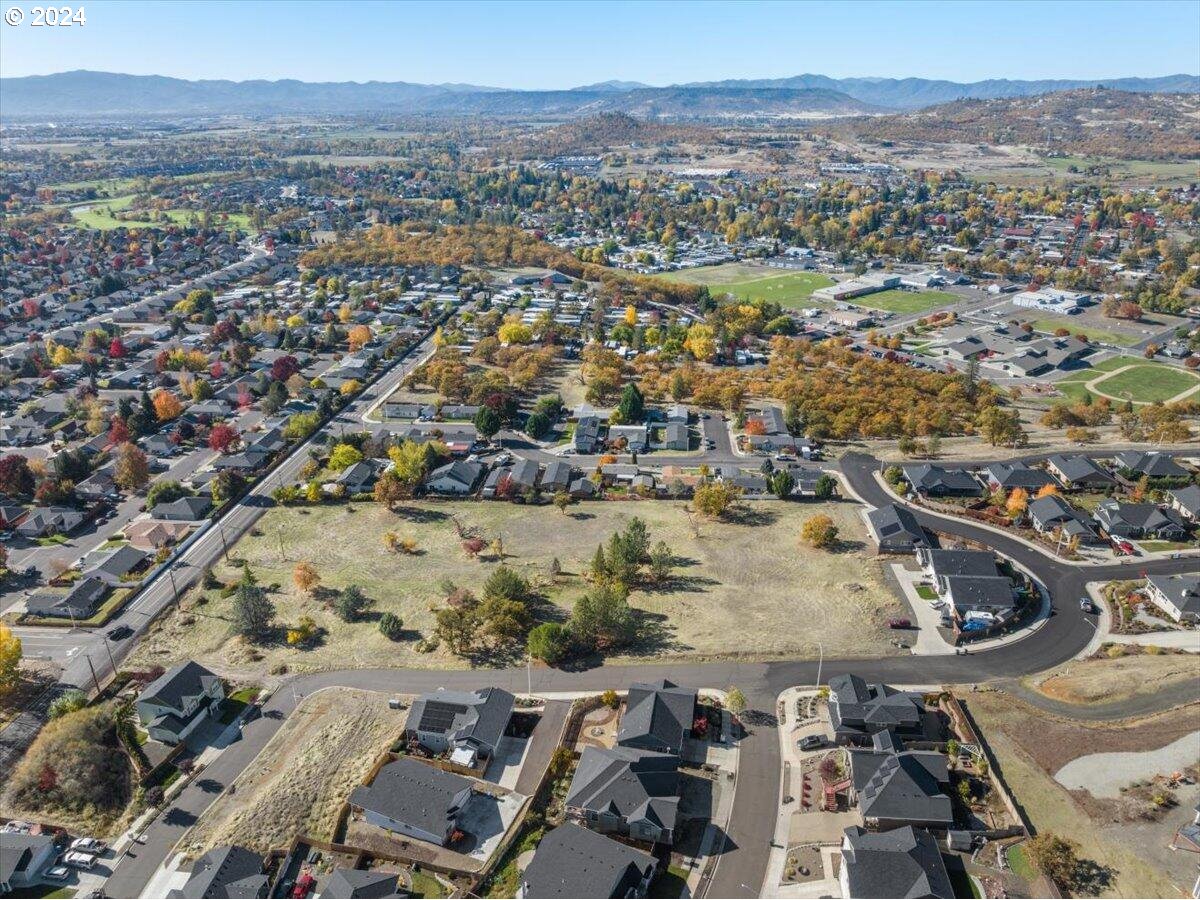 653 Stevens Road Eagle Point, OR 97524 - Photo 5 of 12 an aerial view of residential house and outdoor space