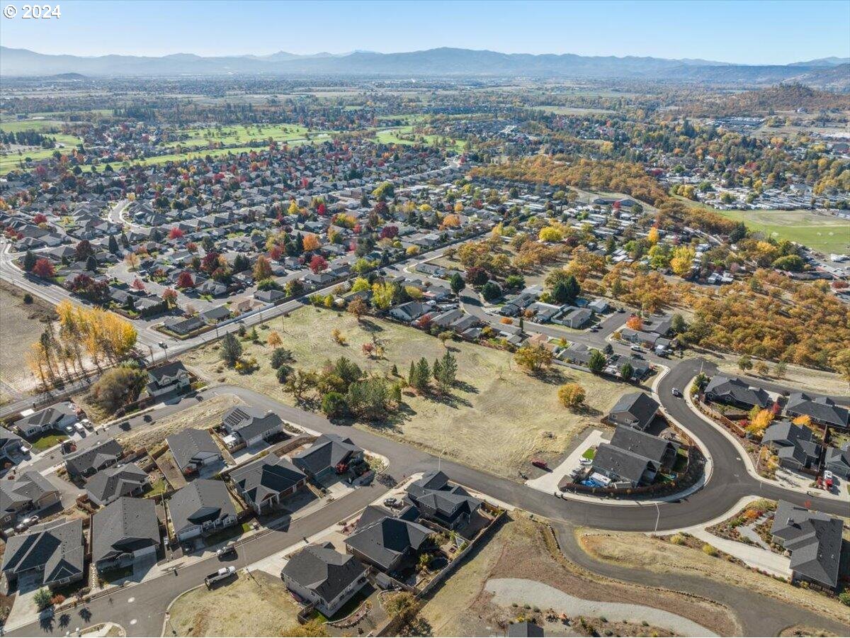653 Stevens Road Eagle Point, OR 97524 - Photo 6 of 12 an aerial view of a city