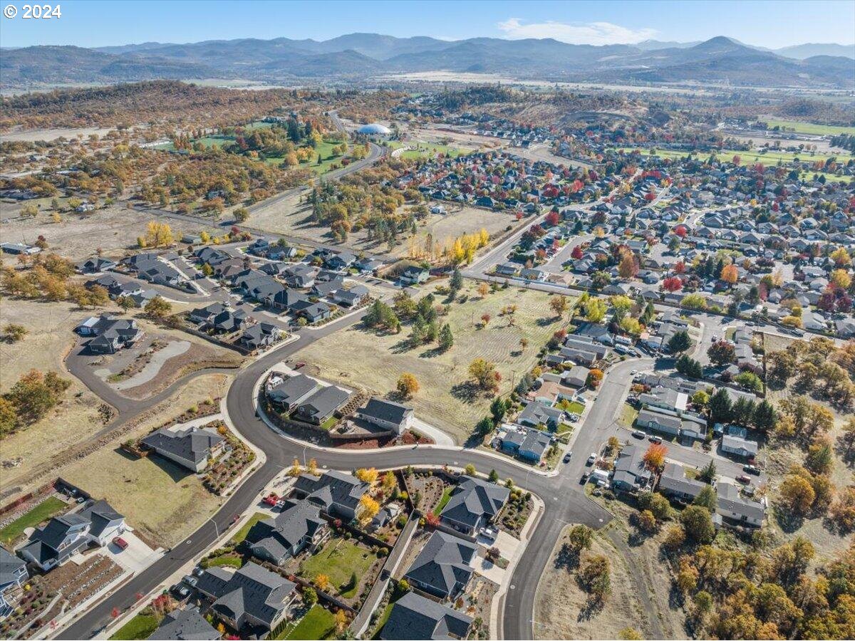 653 Stevens Road Eagle Point, OR 97524 - Photo 8 of 12 an aerial view of residential house and outdoor space