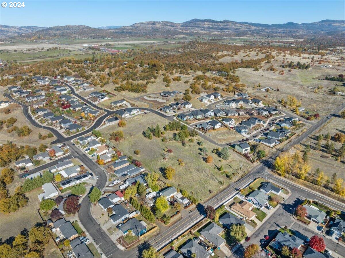 653 Stevens Road Eagle Point, OR 97524 - Photo 9 of 12 an aerial view of residential building with outdoor space