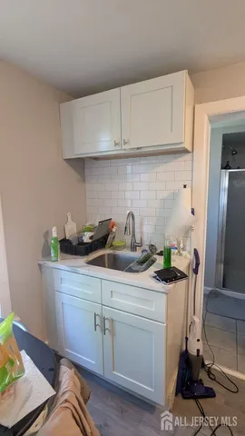 a view of a kitchen with appliances and cabinets