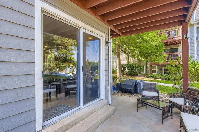 a room with furniture and a window