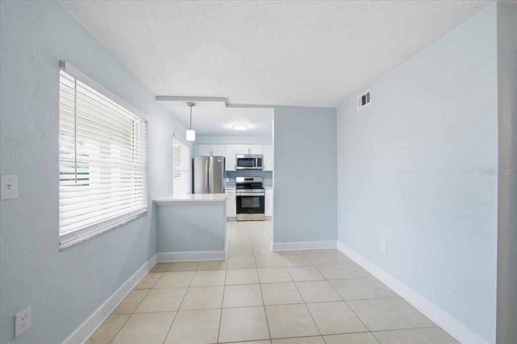 17035 Gulf Boulevard, Unit 118 North Redington Beach, FL 33708 - Photo 13 of 44 a view of kitchen and window