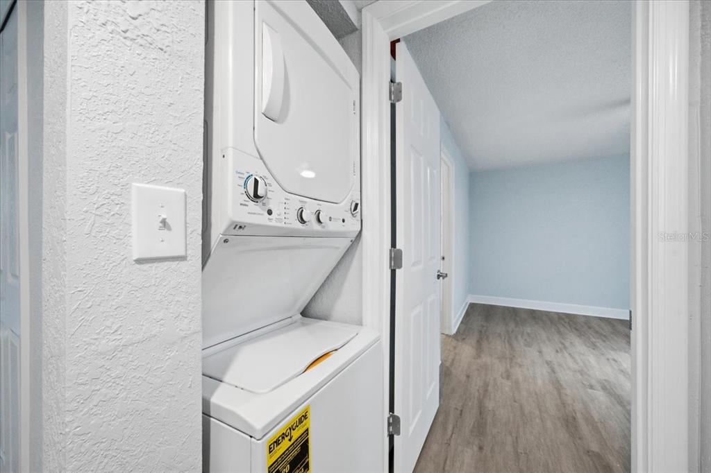 17035 Gulf Boulevard, Unit 118 North Redington Beach, FL 33708 - Photo 32 of 44 a view of bathroom with a toilet a sink and a mirror