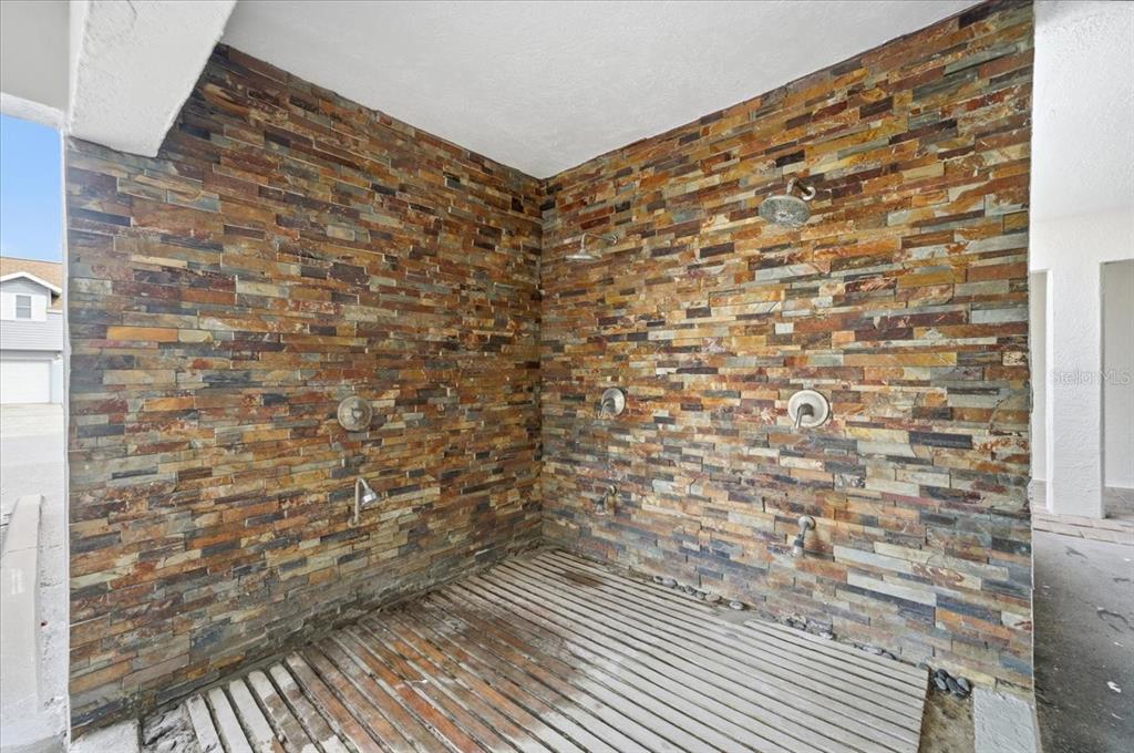 17035 Gulf Boulevard, Unit 118 North Redington Beach, FL 33708 - Photo 34 of 44 a bathroom with a shower