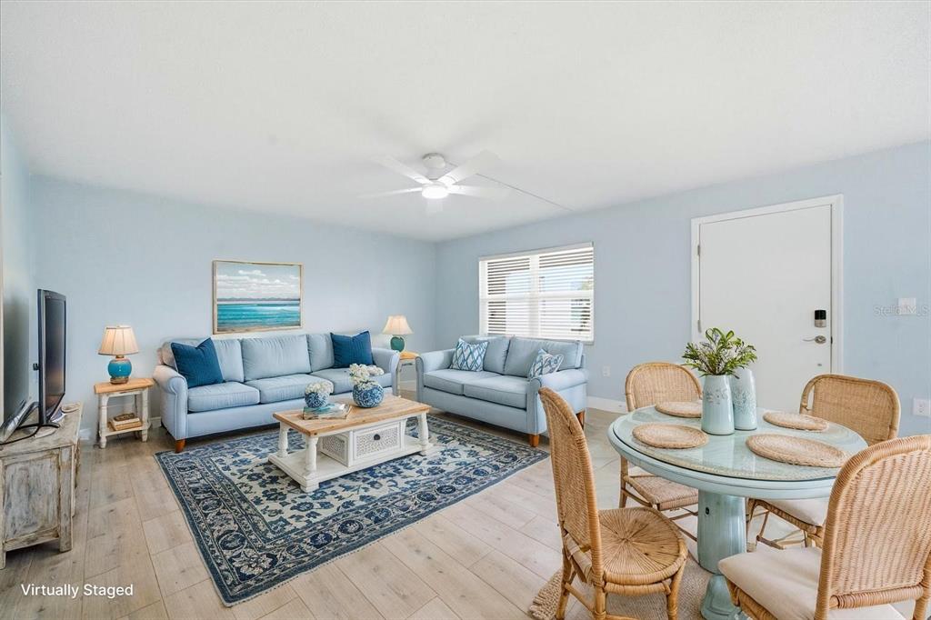 17035 Gulf Boulevard, Unit 118 North Redington Beach, FL 33708 - Photo 5 of 44 a living room with furniture and a couch