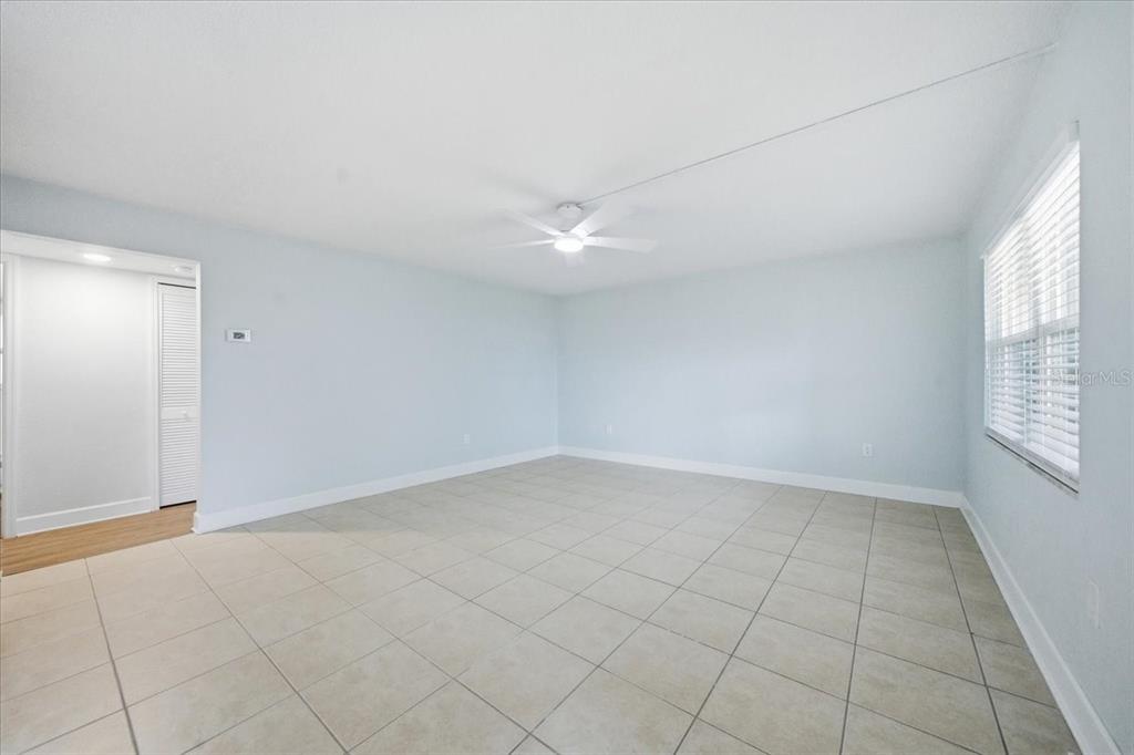 17035 Gulf Boulevard, Unit 118 North Redington Beach, FL 33708 - Photo 9 of 44 a view of an empty room with a window