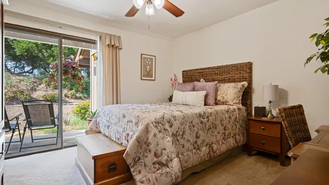 a bathroom with double vanity sinks and a mirror